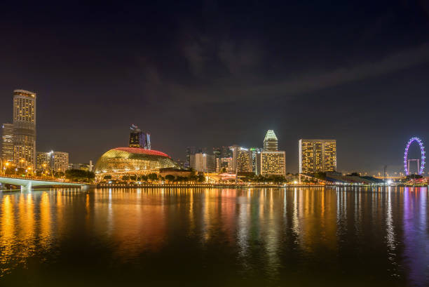 istock Singapore skyline at night, Singapore 1063653954