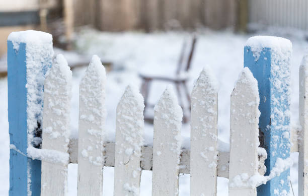 istock Picket fence covered in snow 1063654302