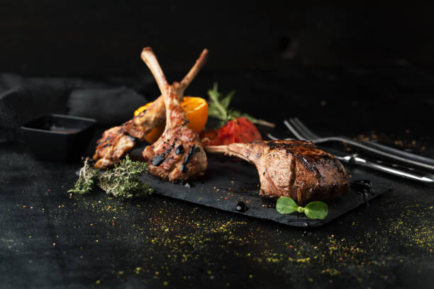 istock Grilled lamb rack with spices and sauce 1063655094