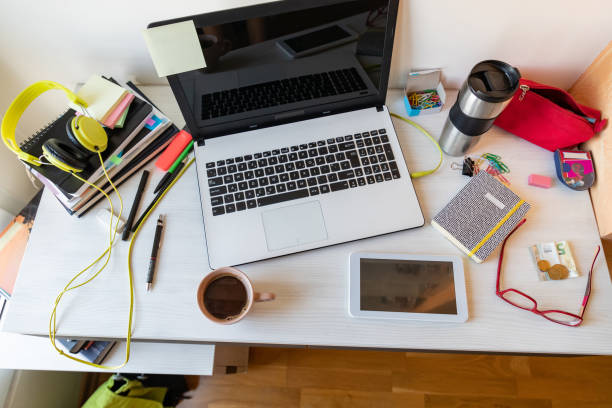 istock Directly above view of a messy desk 1063656370