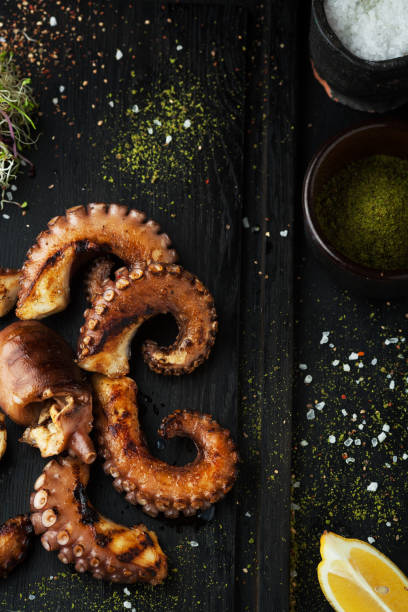 istock Grilled octopus with spices and lemon 1063657764