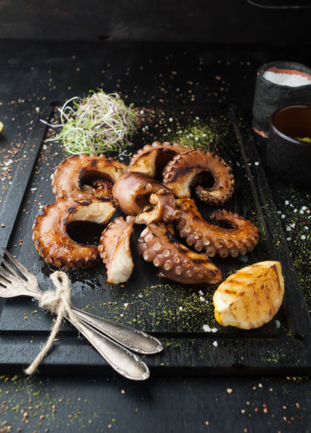 istock Grilled octopus with spices and lemon 1063658562