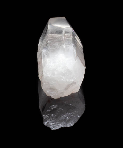 istock Natural quartz rock rhinestone on a black background 1063663340