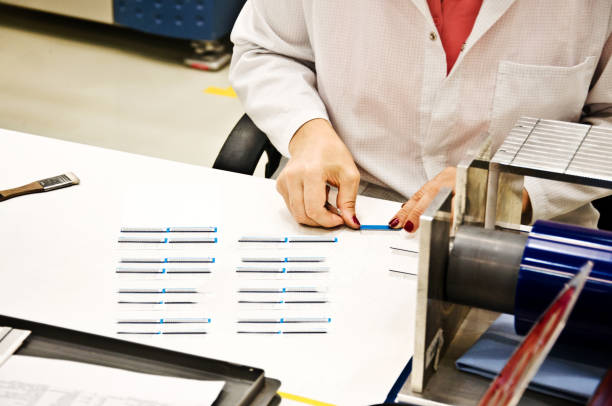 istock Female Engineer (Woman Scientist) Examines a Electronic Sensors In The Laboratory 1063664690
