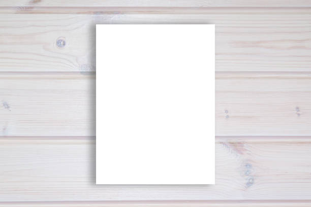 istock Abstract background of new light boards with natural patterns and blank white paper sheet for text, 1063667772