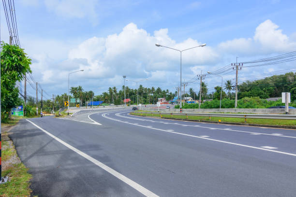 istock Road, way around island with cloud and sky 1063668530