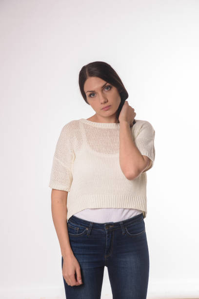 istock White caucasian girl posing emotionally isolated on background 1063673174