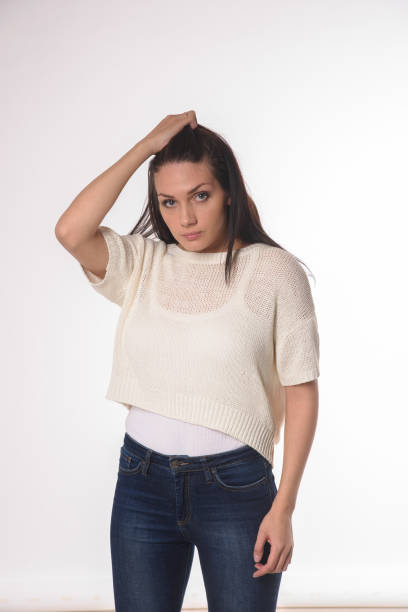 istock White caucasian girl posing emotionally isolated on background 1063673222