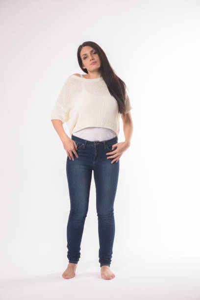istock White caucasian girl posing emotionally isolated on background 1063673404