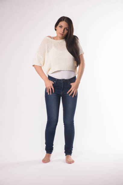 istock White caucasian girl posing emotionally isolated on background 1063673416
