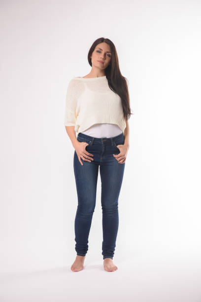 istock White caucasian girl posing emotionally isolated on background 1063673464