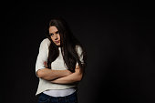 White caucasian girl posing emotionally isolated on background