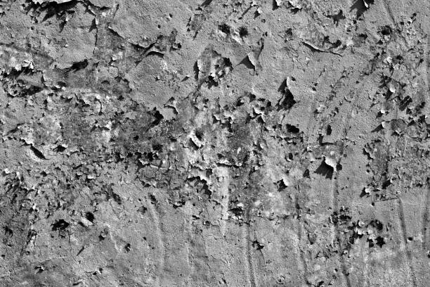 istock Grungy cement wall texture in black and white. 1063674244