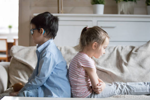 istock Offended brother and sister nor talking after fight 1063676456