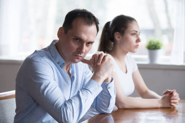 istock Stubborn couple avoid talking to each other after fight 1063676620