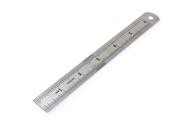 istock Metal measuring ruler in inches at selective focus 1063677018