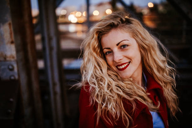 istock Beautiful woman on on railway bridge 1063677500