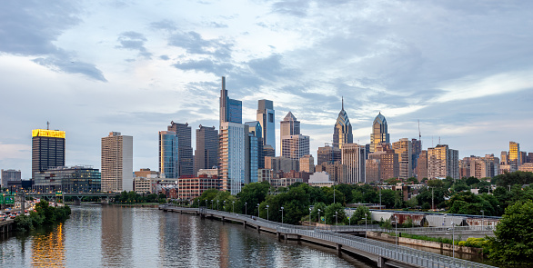 A view of the Philadelphia city skyline in the evening sun.