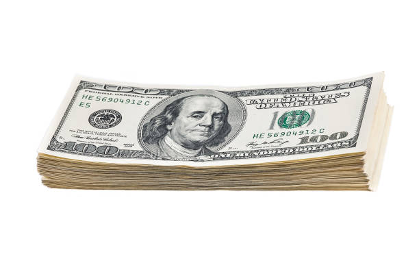 istock A pack of ten thousand dollars on a white background. 1063679608