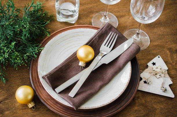 istock Christmas table place setting in vintage or rustic style. 1063680478