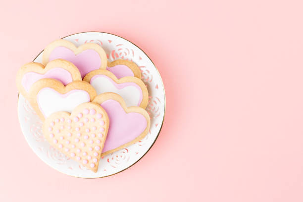 istock Valentine's day cookies close up on pink background. 1063682178