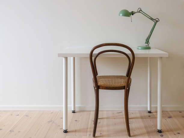 istock Modern retro minimalist workspace in a simple home office room. 1063682636
