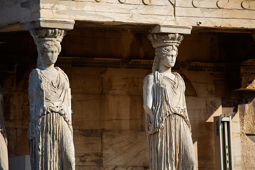 Porch of the Caryatids in Erechtheion, an ancient Greek temple on the north side of the Acropolis of Athens in Greece