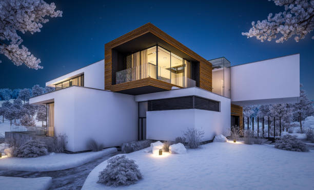 istock 3d rendering of modern house by the river in winter night 1063688358
