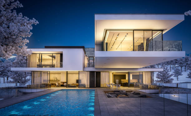 istock 3d rendering of modern house by the river in winter night 1063688412