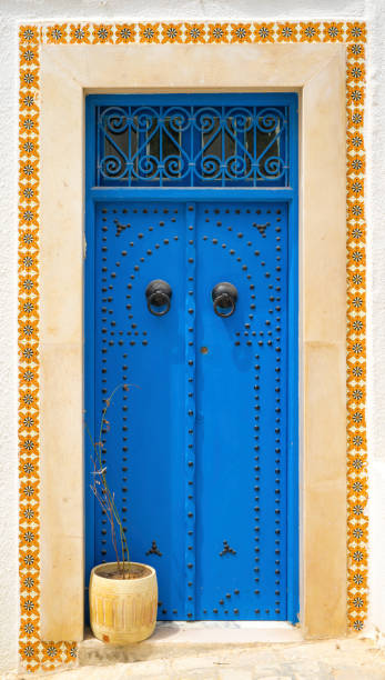 istock Aged Blue door in Andalusian style from Sidi Bou Said 1063688882