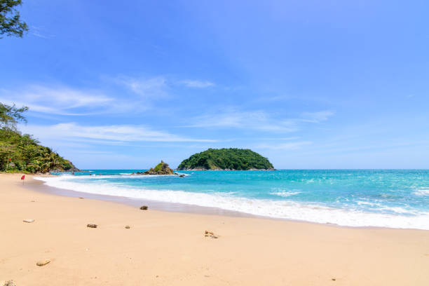 istock Beautiful wave on the beach, clear water, white sand 1063691230
