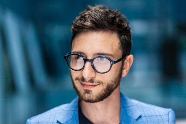 istock Young businessman wearing beard and glasses 1063691350