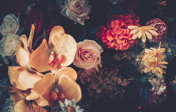 istock Artificial Flowers Wall for Background in vintage style 1063693788