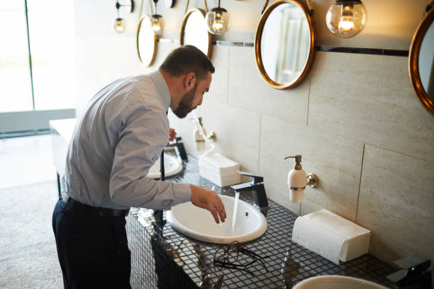 istock Businessman in lavatory 1063702994