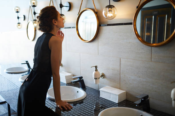 istock Woman in bathroom 1063703026