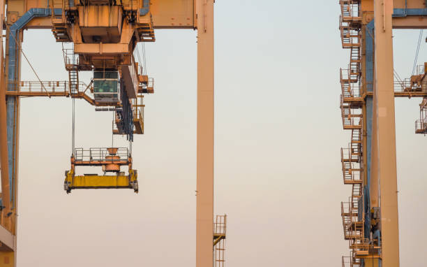 istock Logistics and transportation of Container Cargo ship and Cargo working crane bridge in shipyard 1063706708