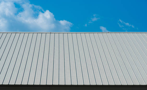 Metal sheet for industrial roof and blue sky. stock photo