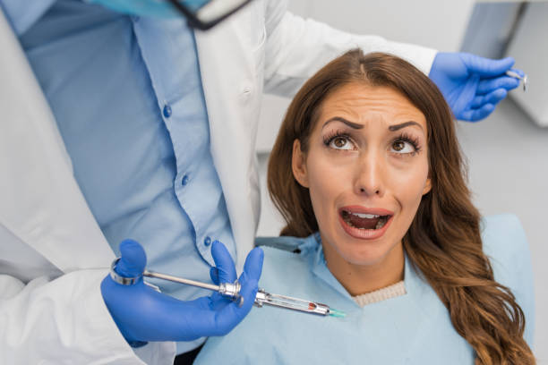 istock Dentist giving anesthesia to the patient 1063717860