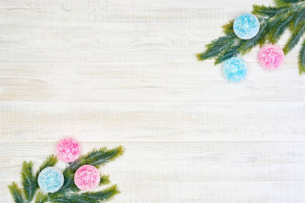 istock Festive composition of Christmas decorations on white wooden background. 1063717868