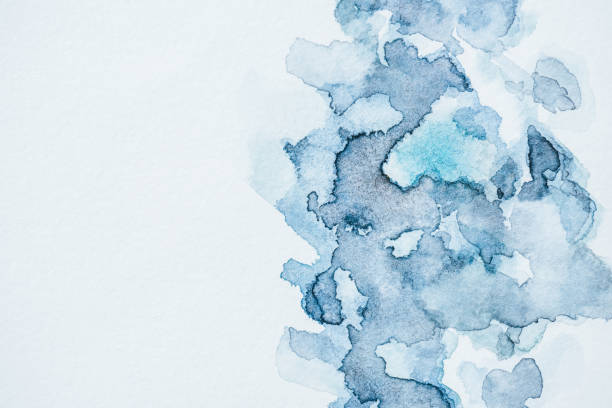 istock abstract background with blue watercolor blots 1063721110