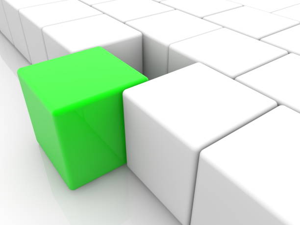istock Toy green cube between white color toy cubes 1063723972