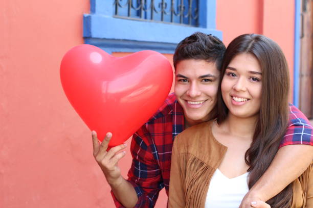 istock Hispanic couple celebrating Saint Valentines day 1063724660