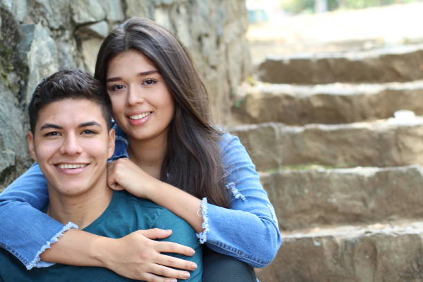 istock Young couple cuddling close up 1063724886