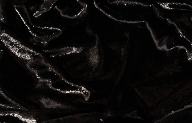 istock luxury background of black glamor fabric with sparkles 1063724904