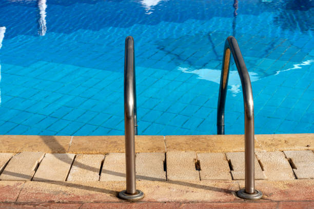 istock Swimming Pool with a Steel Ladder 1063725162