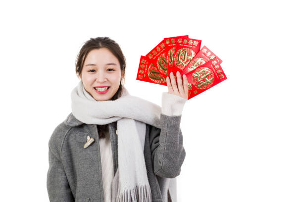 Happy girl holding red packet