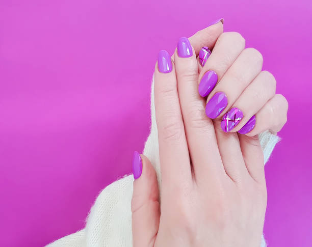 istock female hand manicure sweater 1063728794
