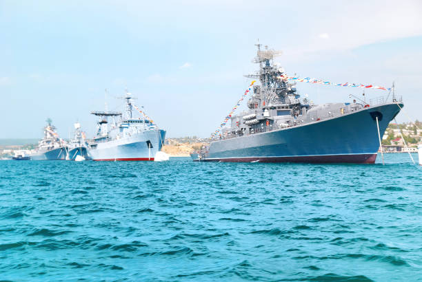 istock Military navy ships in order 1063728860