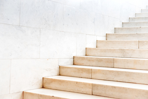 Marble staircase with stone stairs in building