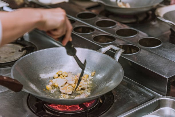 istock cooking thai food in a cooking class 1063731702